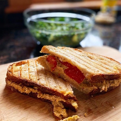 panini-sandwich-hummus-tomatoes-cheese-salad