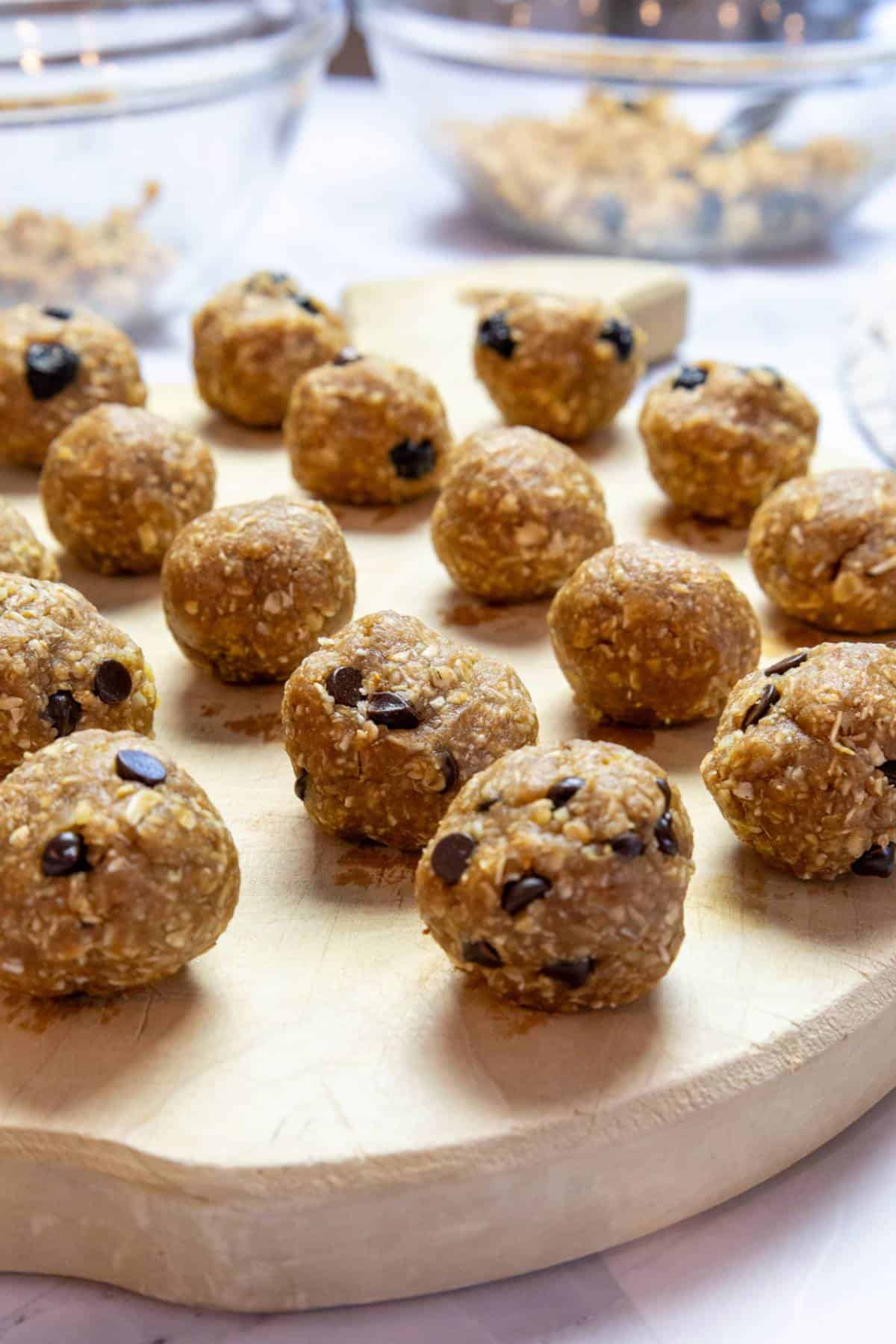 peanut-butter-oatmeal-balls-on-a-wood-cutting-board