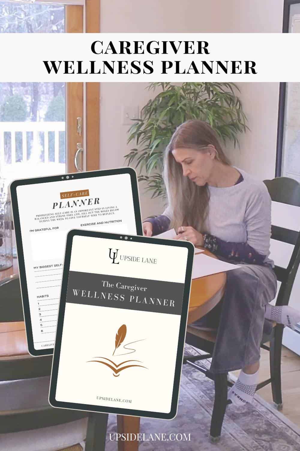 caregiver-wellness-planner-on-ipad-with-woman-sitting-at-a-table-working-on-planner