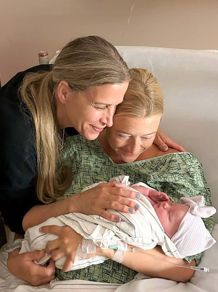 mother-hugging-daughter-new-granddaughter-in-hospital