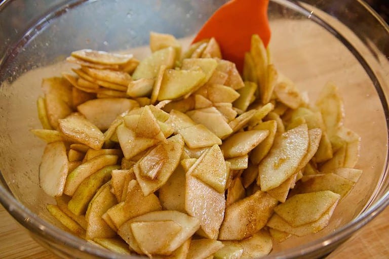 sliced-apples-cinnamon-sugar-glass-bowl