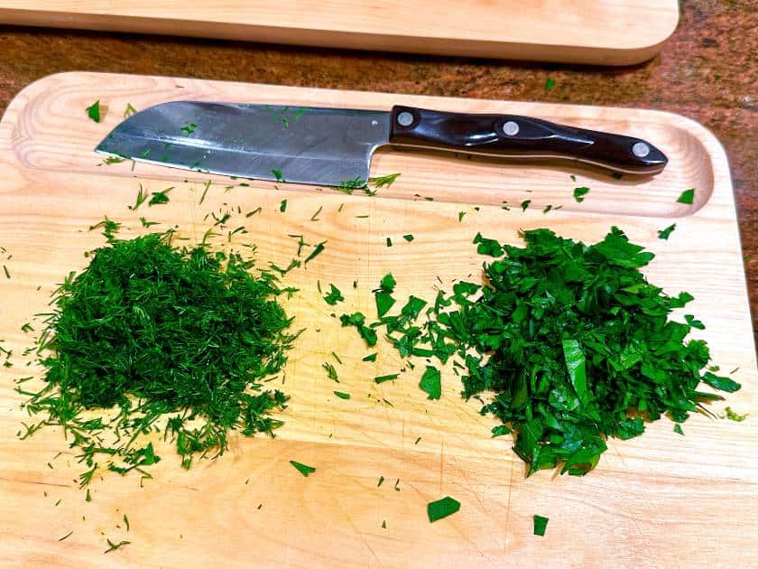 chopped-parsley-dill-cutting-board-knife