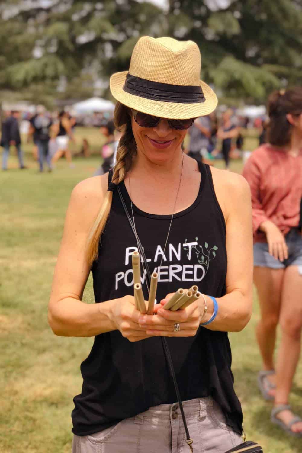 dawn-at-vegan-festival-admiring-her-purchase-smiling