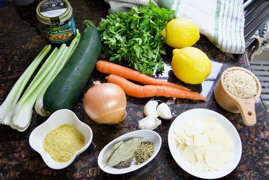 ingredients laid out on the kitchen counter to make a lemon and rice soup recipe