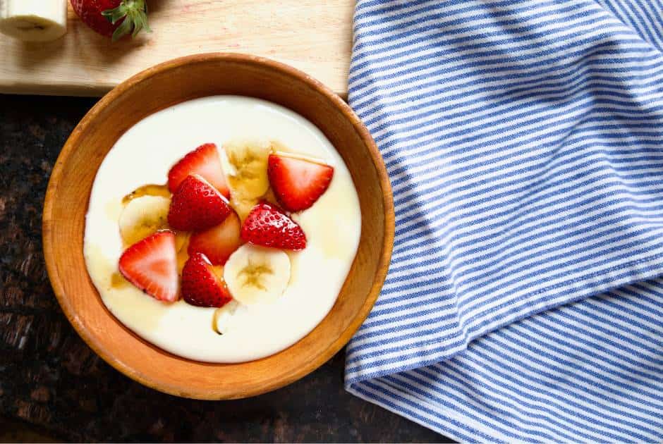 non-dairy yogurt with maple syrup and fruit