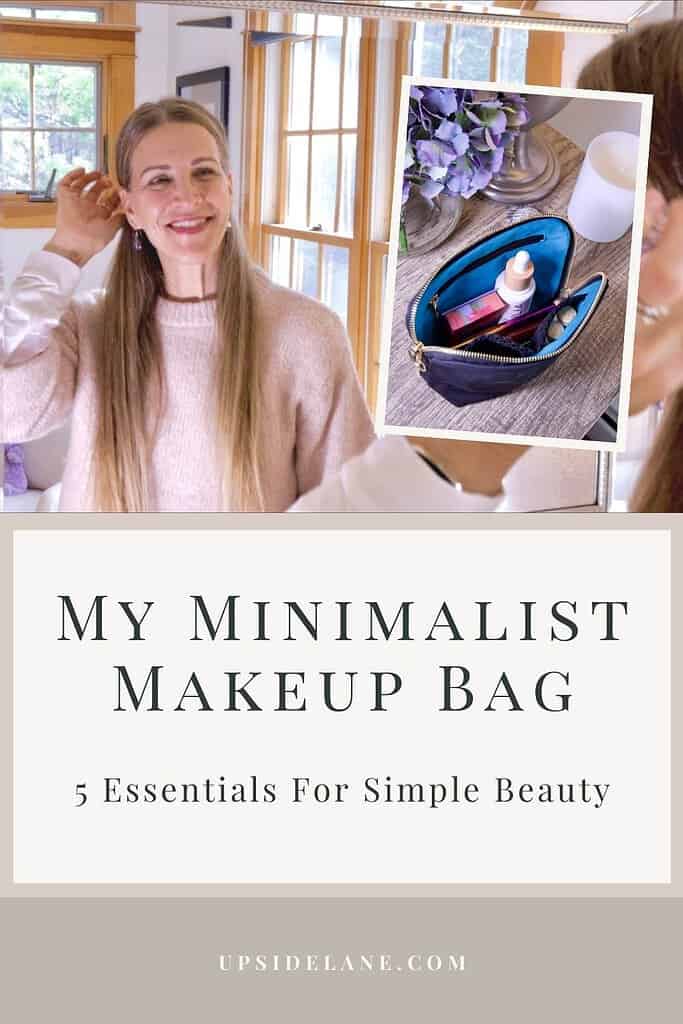 my minimalist makeup bag woman smiling while looking at herself in the mirror