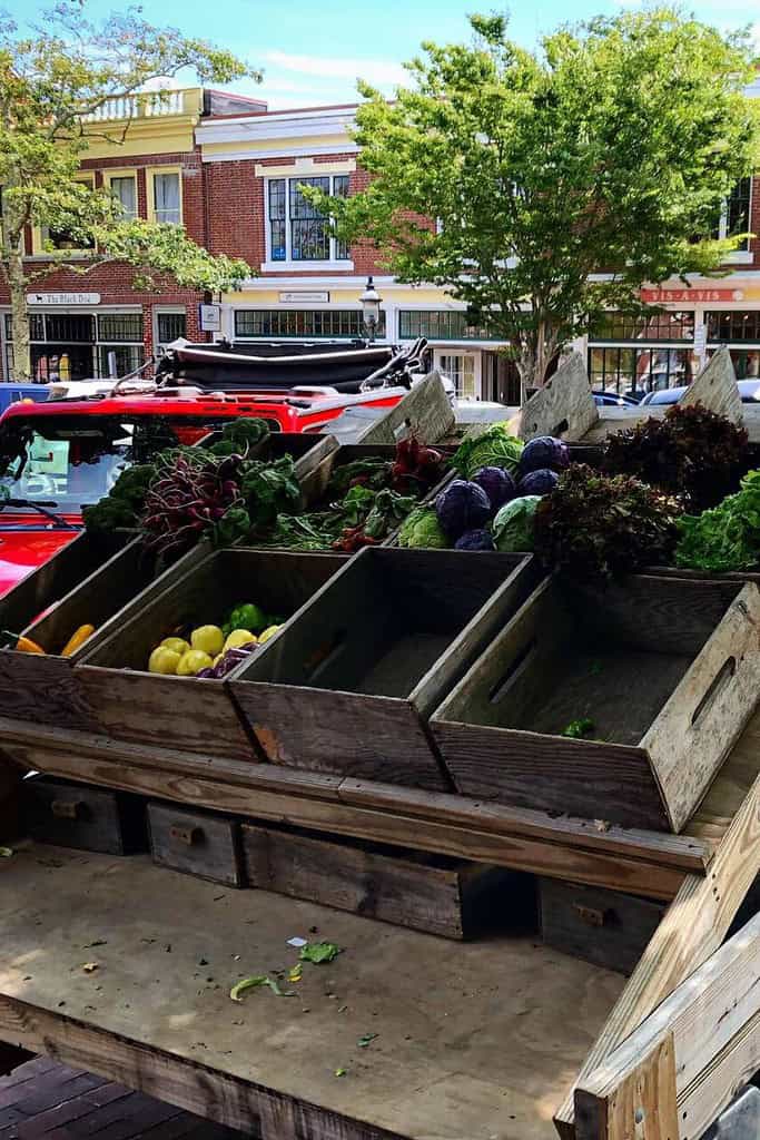 open market fruit truck with baskets of fruits vegetables