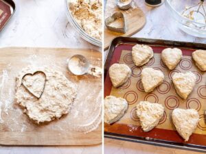 dough on a cutting board using a heart shaped cutter to make scones