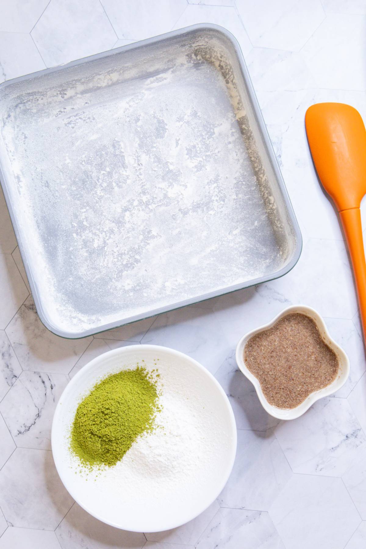 greased-and-floured-brownie-pan-sifted-powdered-sugar-matcha-powder-flax-egg